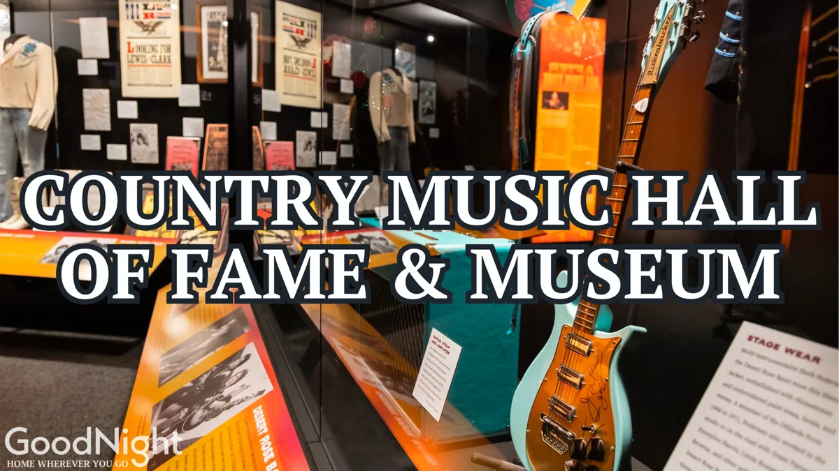 An interior shot of a music museum featuring a guitar, exhibit displays, and posters. Visitors explore memorabilia and learn about Nashville’s storied musical history, creating a nostalgic atmosphere deeply rooted in the city’s identity.