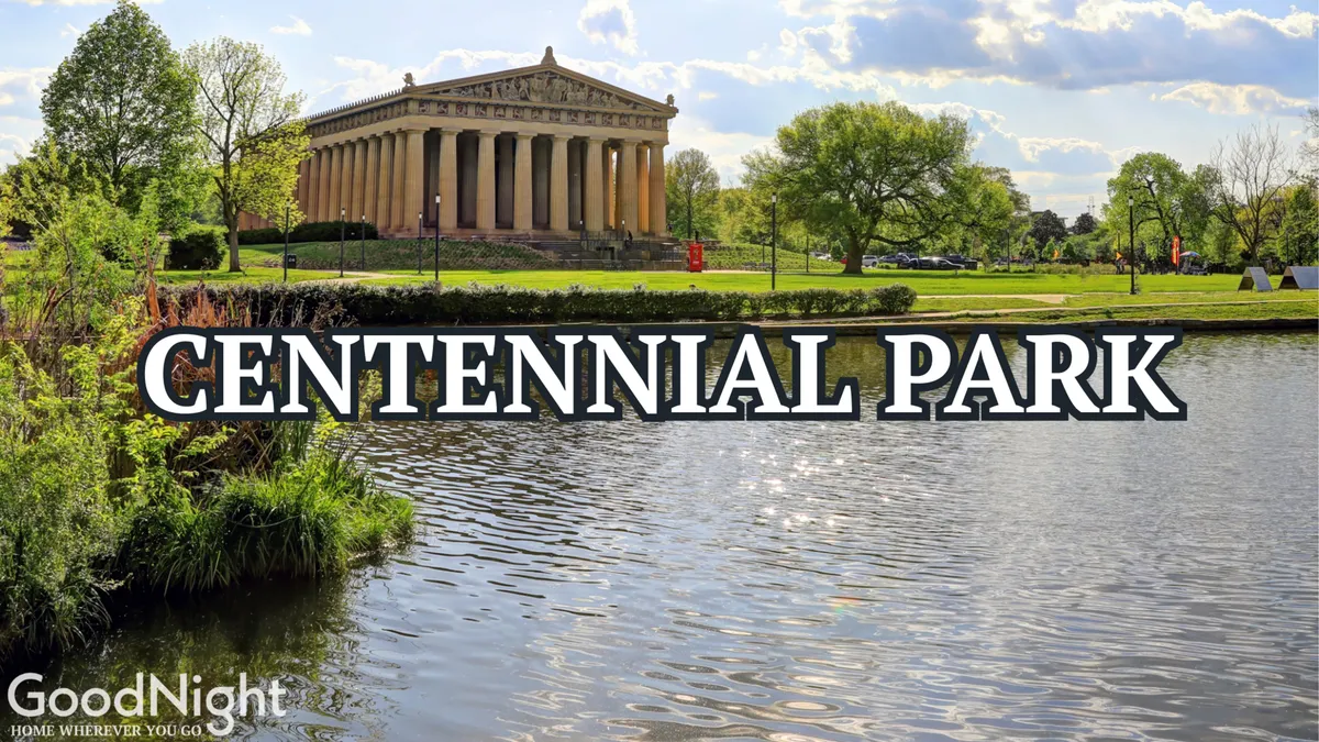 This exterior image shows a Parthenon-like structure set beside a tranquil lake and surrounded by lush greenery, inviting visitors to walk, picnic, and enjoy nature. Its serene mood highlights the opportunities for leisurely outdoor activities and cultural exploration in Centennial Park.